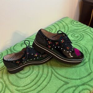 Betsey Johnson PIXXY platform loafer dress flats, featuring a lace-up closure